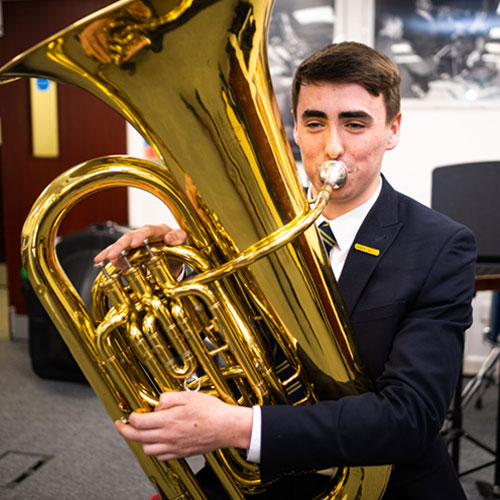 Stafford Grammar pupil playing the tuba